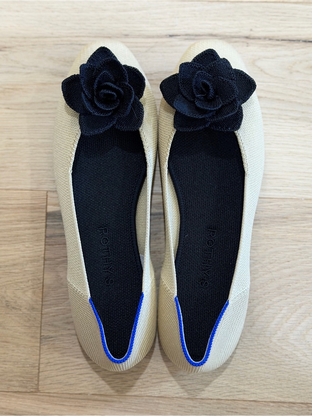 Rothy's Beige Ballet Flats with Black Floral Appliqué